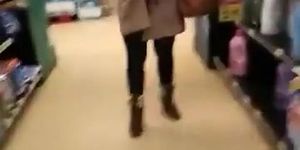 Woman in short dress supermarket upskirt