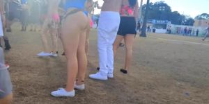 Sexy brunette's round ass on candid footage