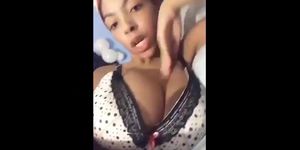 Ebony laying down w big titties