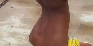 Black Woman Dancing nude in at a Festival
