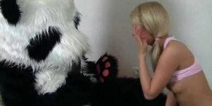 PANDA FUCK - Teddy bear with a black cock in her mouth gave the blonde