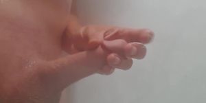 Playing in the shower (cumshot)