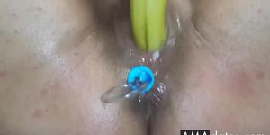 Amateur Milf Squirting fucking a Banana with Anal Beads