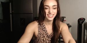 muscular girl flexing on webcam