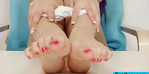 Mona Lee strokes plastic cock with her feet