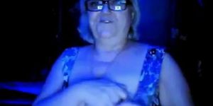 hot granny flashing her big tits of her husband hidden (amateur )