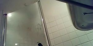 Spy camera catches chick getting out of shower
