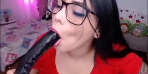 Cute latina with glasses gets sloppy with dildo