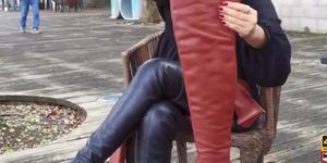 Oriental lady swapping thigh boots to crotch boot