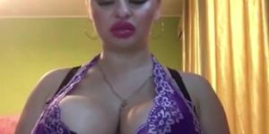 blonde girl shows her big boobs