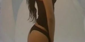sexy brunette striptease
