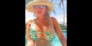 Olga Loera bouncing her boobs in a bikini by the pool