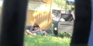 Drunk girl having sex with a boy under a tent