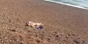 Found teen asleep topless on uK beach