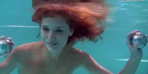 Sexy underwater redhead Nikita Vodorezova