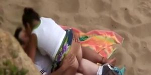 Chubby girl rides boyfriends dick in beach