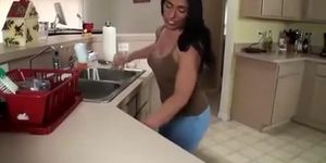 Latina housewife pisses in her pants while washing dishes