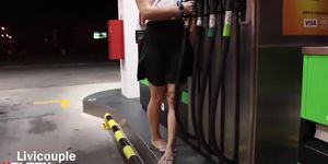 Miss_Livi undressing while pumping gas