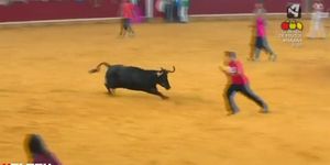 Guy Gets Stripped By Bull