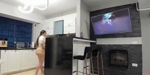 Thick girl stripping down in the kitchen with her webcam on!