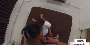 Petite amateur Thai teen Cherry in sexy uniform fucked by a big white cock