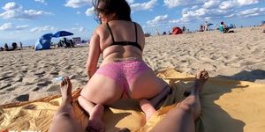 Getting rough for her on the beach