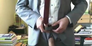 Hot daddy in suit handjob