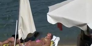 Topless women at beach