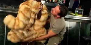 Girl in fur coat. Sex in bar