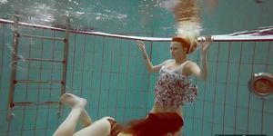 Nudist babes in the pool underwater stripping