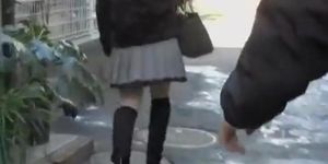 Big booty Asian bimbo gets spanked while taking street walk