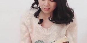 Asian girl reading