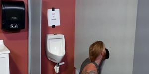 ExtraBigDicks - Tattooed Redhead Takes Raw BBC Through Glory Hole