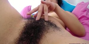 Closure view of her hairy pussy