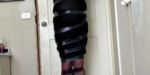 Daisy all taped up in tight black dress
