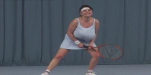 Busty girl playing tennis topless