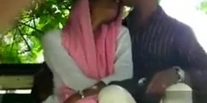 Foxy Desi girl gives her friend a handjob in public