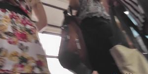 Public upskirt shows slim-shaped girl in the bus