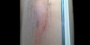 Round ass Milf with hairy pussy gets wet in her shower