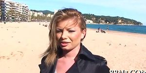 Blonde MILF walks on the beach before sex