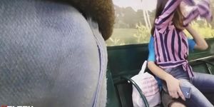 Girl on boyfriend's lap looking bulge