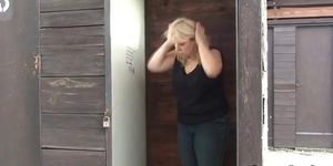 Outdoors screwing for a busty GILF by a young blond man