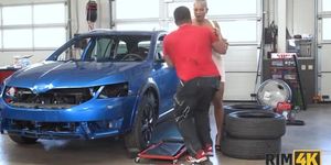 Busty blonde licks mechanic's ass in the garage