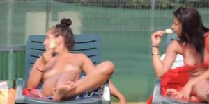 Topless babes are secretly filmed while they tan