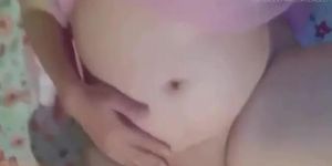 Tempting MILF shows off huge boobs and wet vagina