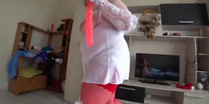 A busty mature blonde with a nice ass jumps on a big dildo and shakes a juicy butt in white panties, milf is having fun with a g