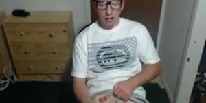 Cute nerdy boy cum to face on webcam
