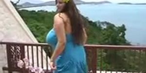 Eden Mor in turquoise sundress