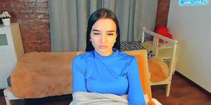 relaxed Asian camgirl blue half top