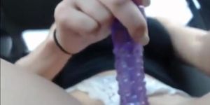 Amazing blonde plays with dildo and squirts in car